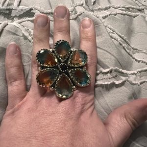 Sterling silver adjustable orange and blue glass flower ring